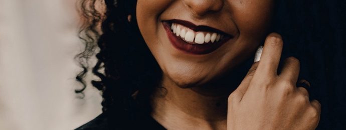 upclose image of someone smiling with their teeth showing